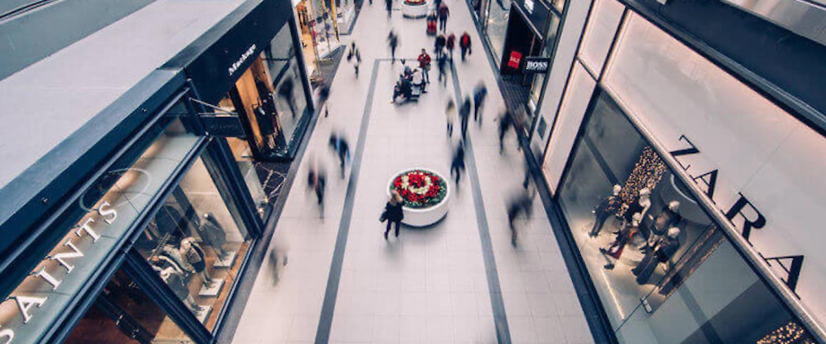 motion blur photograph inside mall