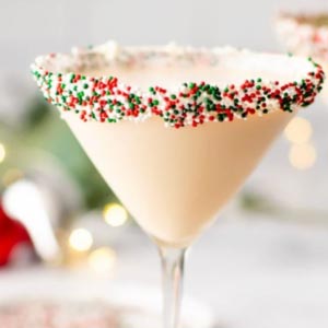 Sugar Cookie Martini Cocktail with sprinkles on the rim of the glass